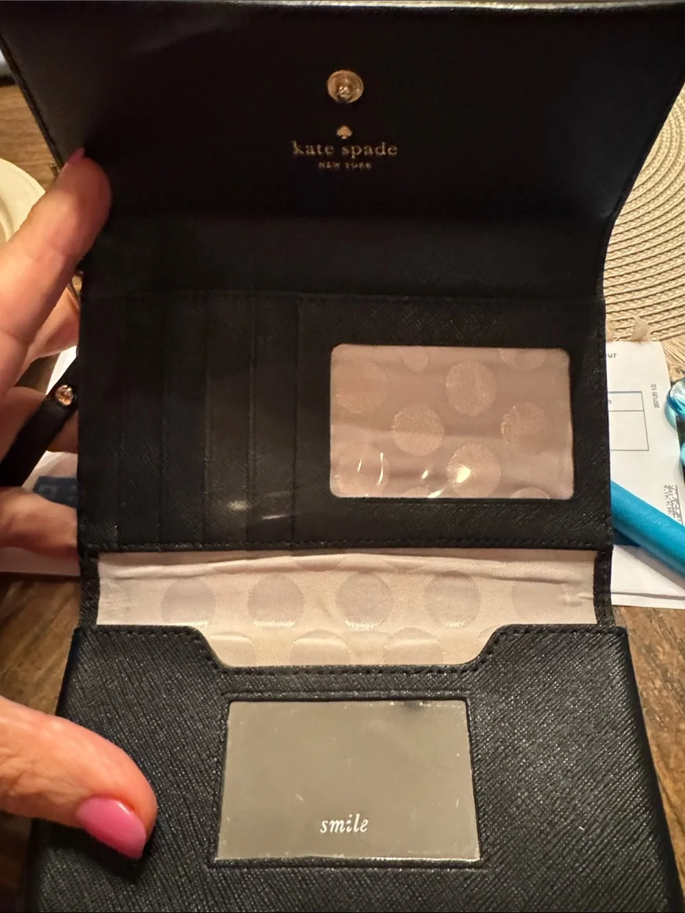 kate spade black saffiano leather wallet with gold logo